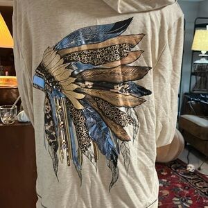 Extra large, beige colored hoodie by liberty wear headdress print western